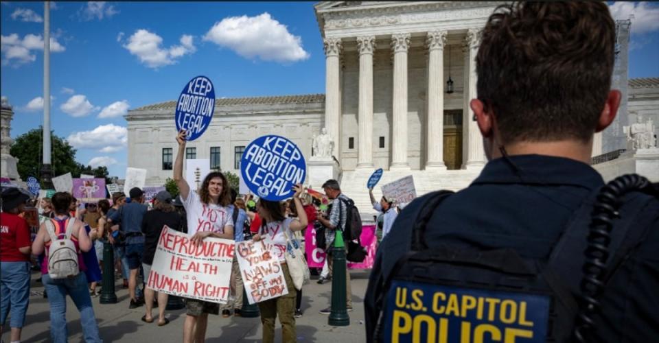 Protesters gather near the Supreme Court in July to mark the 2nd anniversary of the Dobbs decision that saw abortion protection overturned nationwide (Bel Trew/The Independent)