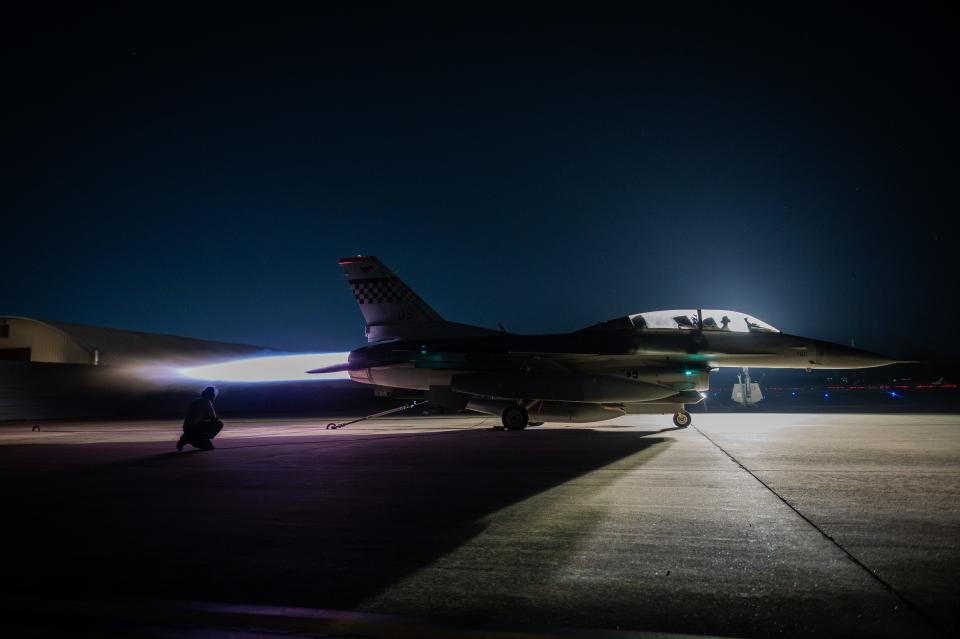 U.S. Air Force crew chiefs from the 36th Fighter Generation Squadron conduct a maximum power test on an F-16 Fighting Falcon at Osan Air Base, South Korea, Sept. 7, 2023.