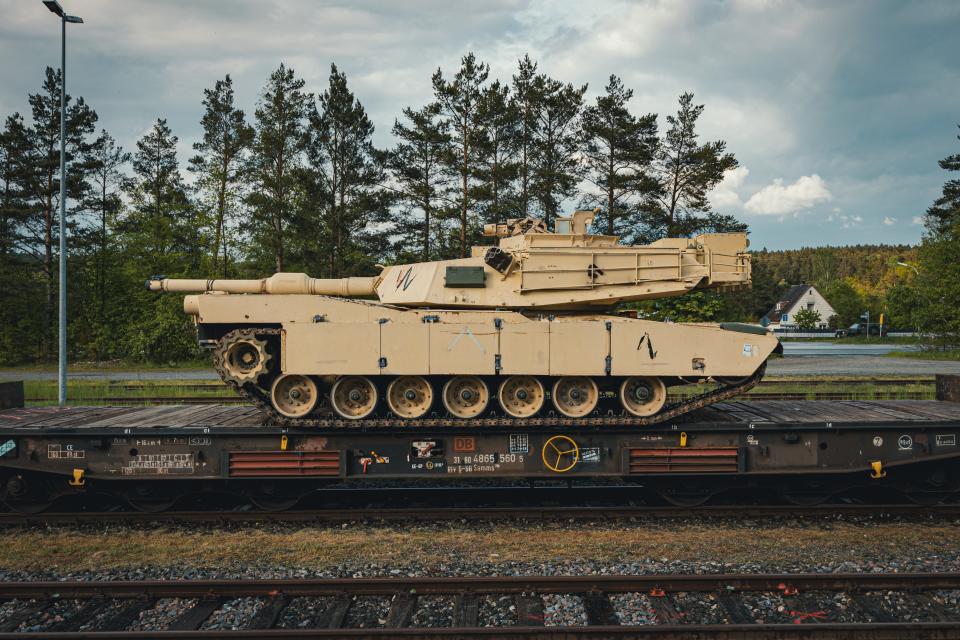 M1A1 Abrams tanks, needed for the training of Ukrainian soldiers, await unloading in Grafenwoehr, Germany.