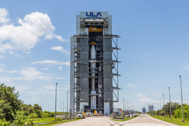 An Atlas V rocket sits fully stacked in ULA's hangar at Cape Canaveral Space Force Station in Florida, in preparation for the rocket's final mission for the U.S. Space Force.