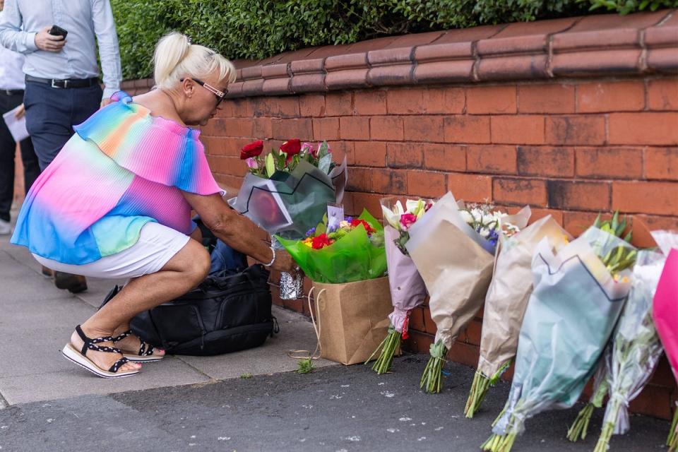 Flowers left at the scene of the tragedy in Southport (James Speakman/PA)