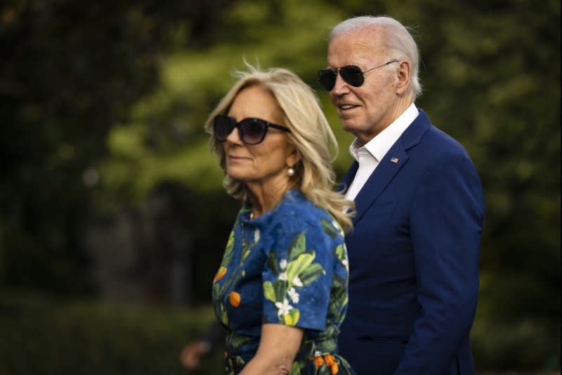 President Joe Biden and First Lady Jill Biden walk across the South Lawn toward the White House after landing aboard Marine One on Sunday, July 7, 2024, in Washington, D.C. The President and First Lady are returning to the White House after campaign events in Philadelphia and Harrisburg, Pennsylvania. Photo by Samuel Corum/UPI