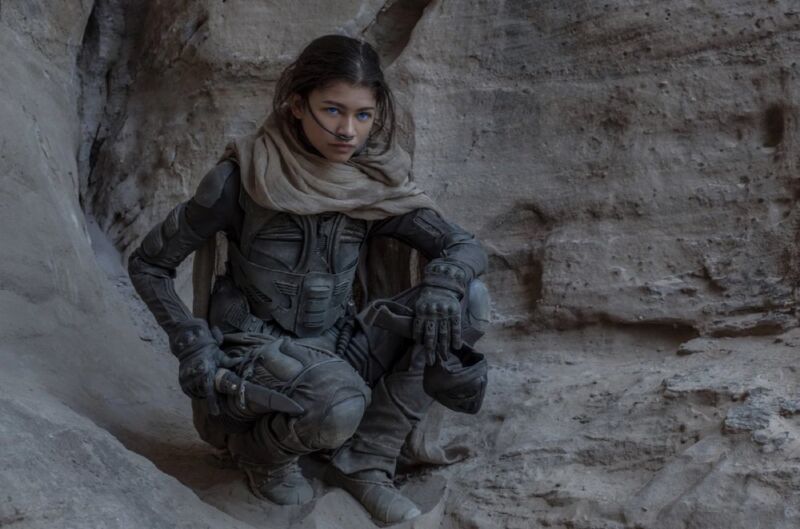 photo of Fremen woman in a still suit kneeling