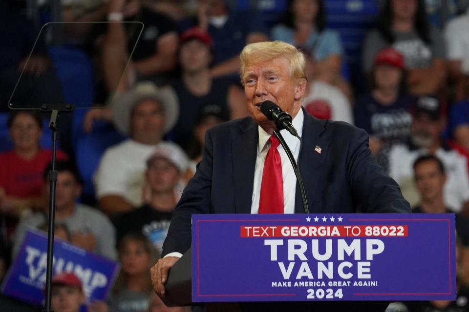 Republican presidential candidate and former U.S. President Donald Trump speaks during a campaign rally with his running mate Senator J.D. Vance, in Atlanta, Georgia, U.S., August 3, 2024.