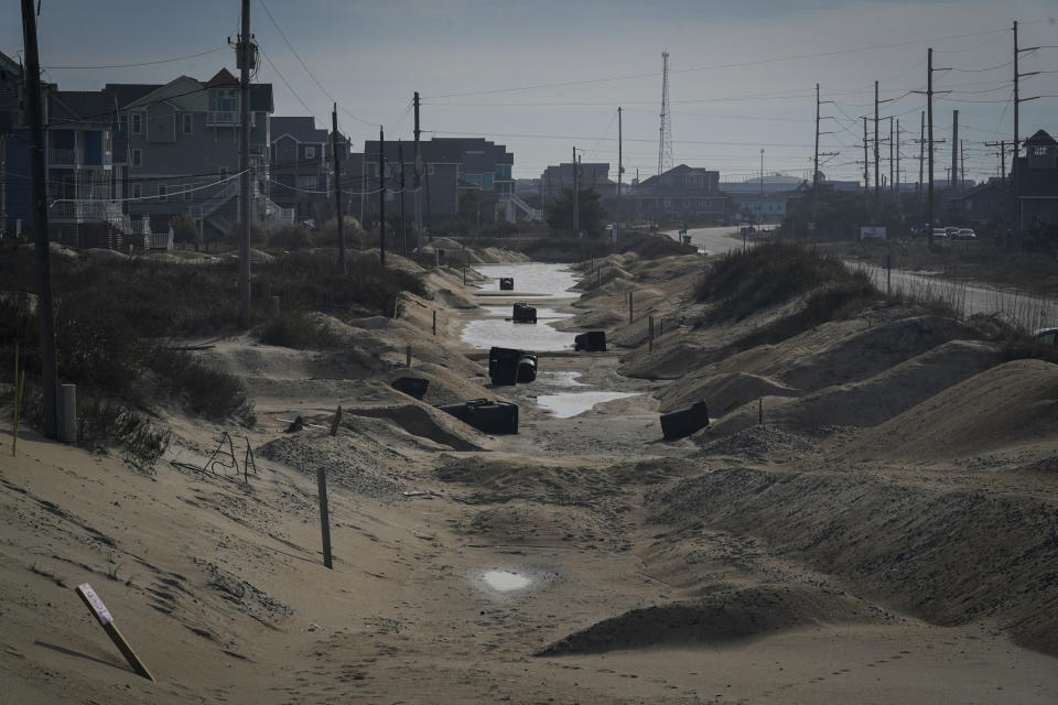 Water and sand cover Seagull Street, which was completely covered by the waves of the Atlantic Ocean in 2022. 