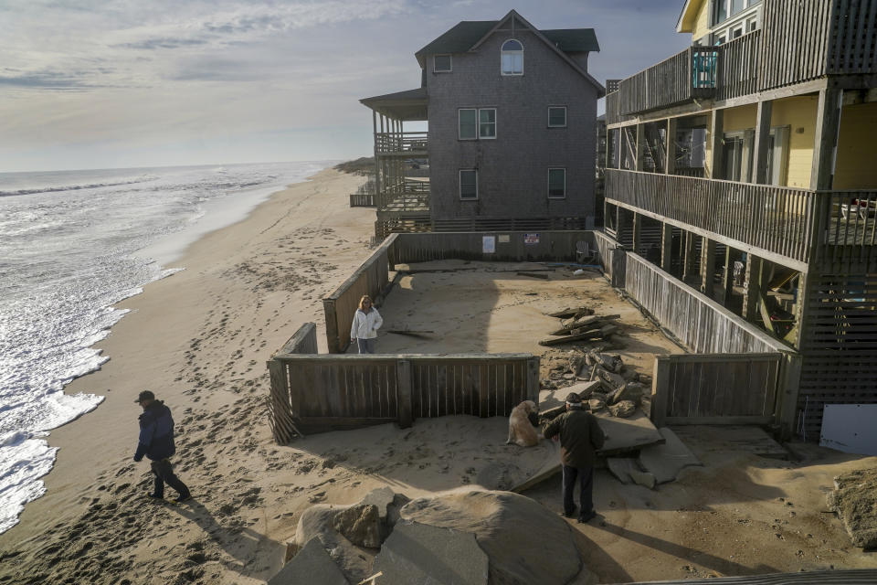 Outer Banks residents will stand where a swimming pool once stood in their backyard on the Outer Banks beach in 2022.