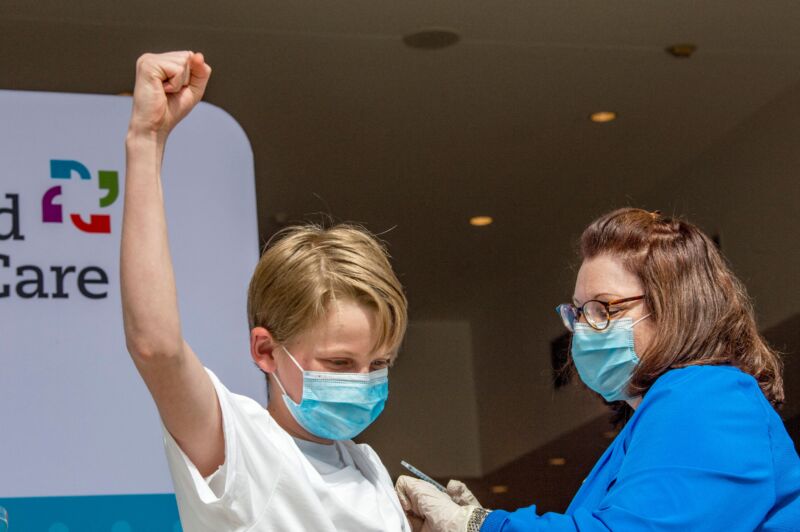 A 13-year-old celebrates receiving the Pfizer-BioNTech COVID-19 vaccine in Hartford, Connecticut, on May 13, 2021. 