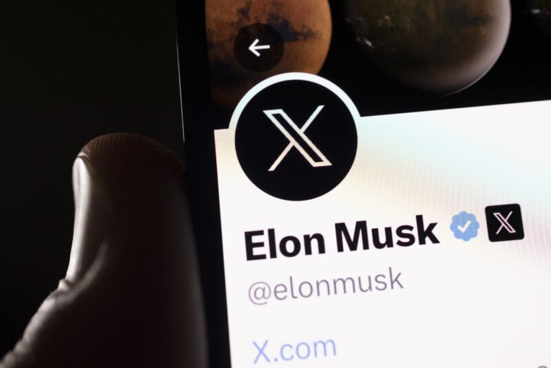 A smartphone shows Elon Musk's profile on X, the app formerly known as Twitter.