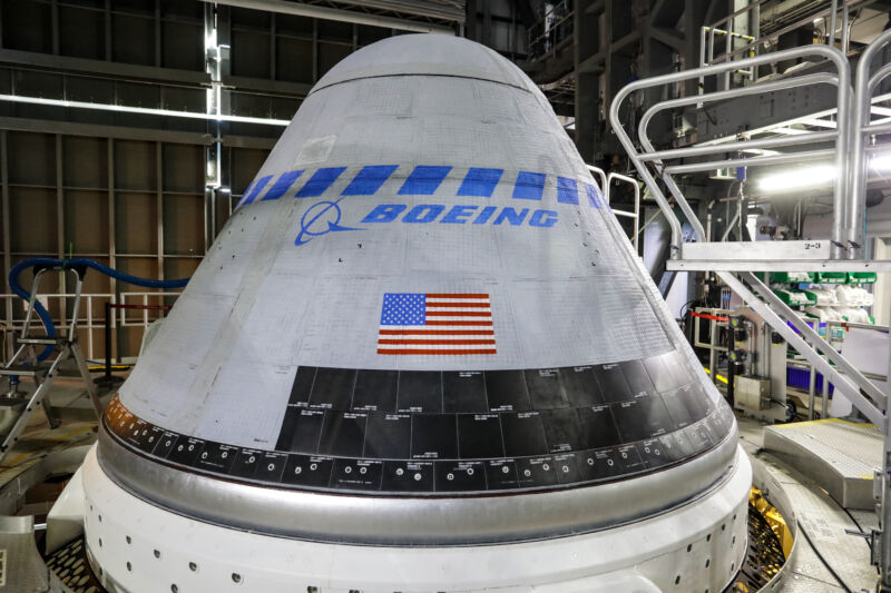 A Starliner spacecraft mounted on an Atlas V rocket for an unmanned test flight in 2022.