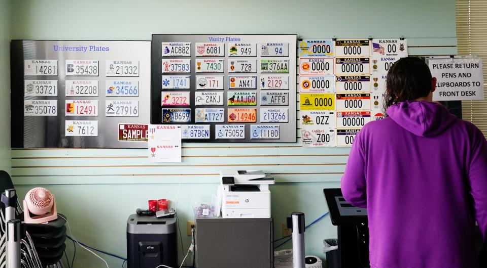 Customers walking into the Shawnee County Motor Vehicle Annex, 5938 SW 17th St., on Friday will be greeted with a display of the more than 40 different license plate styles for the state. A bill sent to Gov. Laura Kelly’s desk this week could add three more, including one of the Topeka flag.