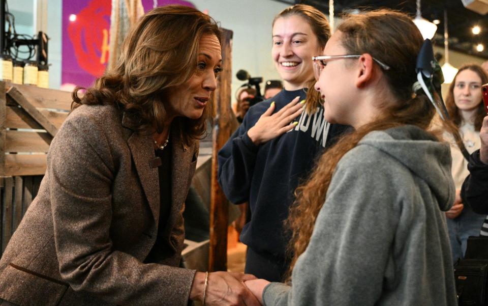 Ms Harris meets her supporters at a campaign rally in Pennsylvania, where the poll narrowed her lead in the overall polling average to just 0.3 percent