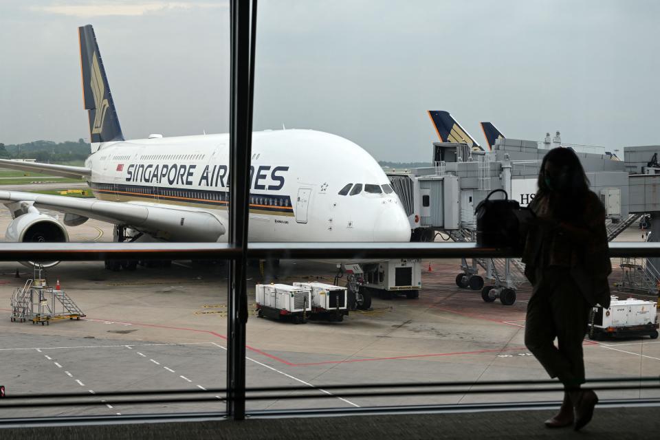 A Singapore Airlines Airbus A380 aircraft is parked on the tarmac at Singapore Changi Airport in Singapore on October 24, 2020.