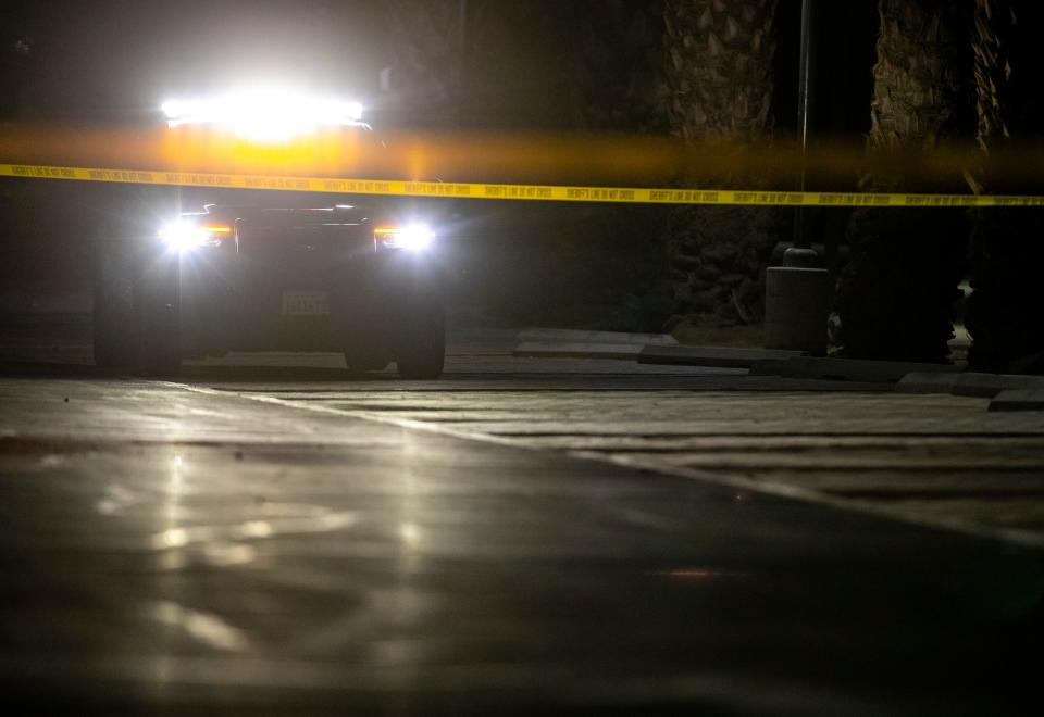 A Riverside County police cruiser is parked at a suspected crime scene at the Aquatic Center in Palm Desert, Calif., Friday, Sept. 13, 2024.