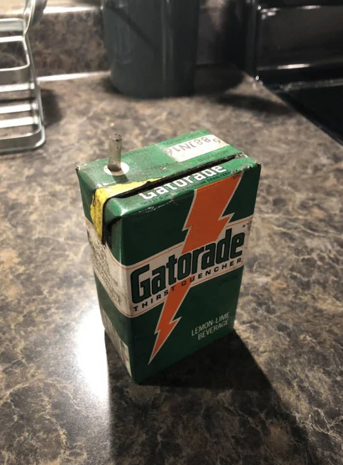 Vintage Gatorade Lemon-Lime carton that looks like a juice carton, with the straw still in it