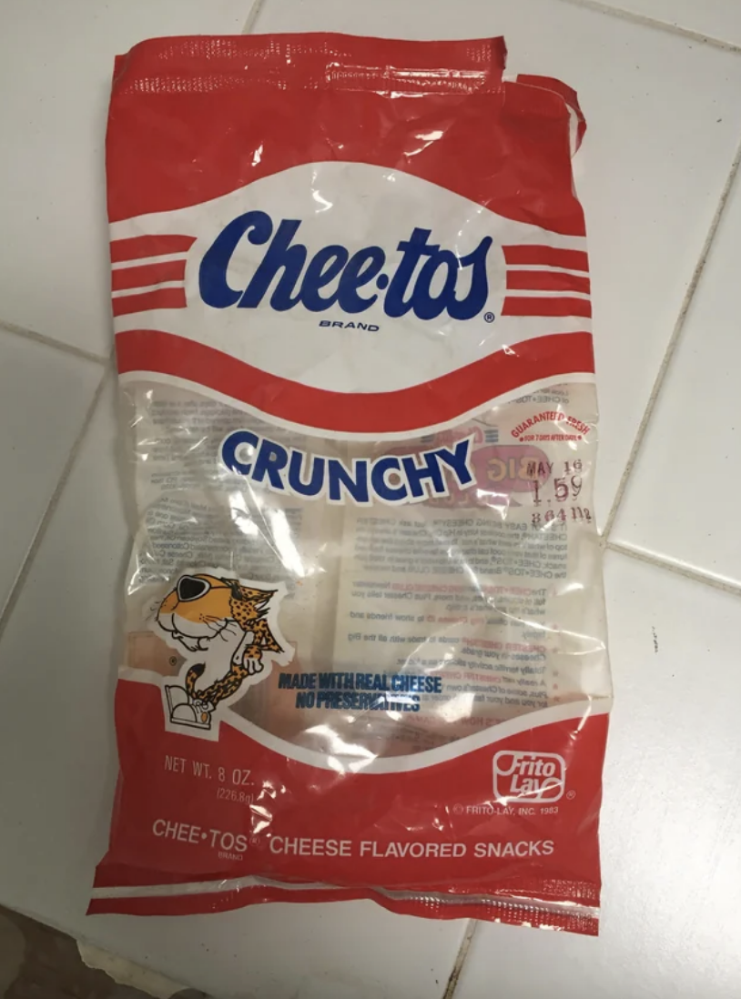 Cheetos Crunchy snack bag that is transparent and has the Cheetah brand on the bottom