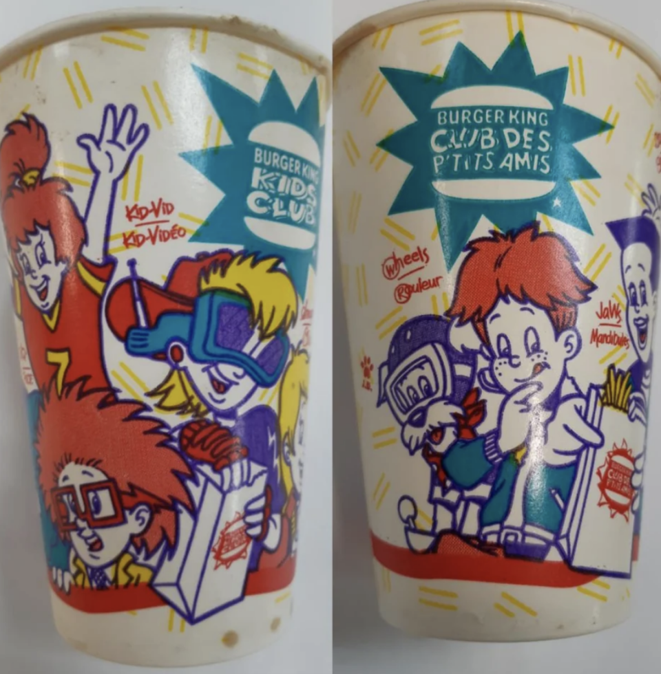 Kids Meal Cup with illustrated Burger King Kids Club characters engaged in food and gadgets