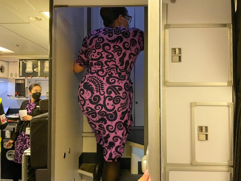 Flight attendant Alice climbs into the bedroom where pilots rest during long flights.