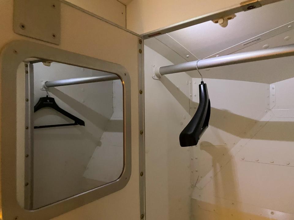 In the pilot's rest area there is a cupboard where uniforms can be stored.