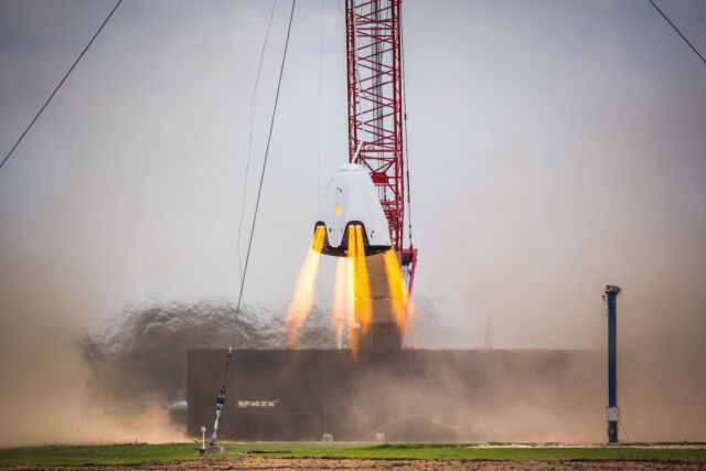 A hover test of SuperDraco thrusters on a prototype Crew Dragon spacecraft in 2015.