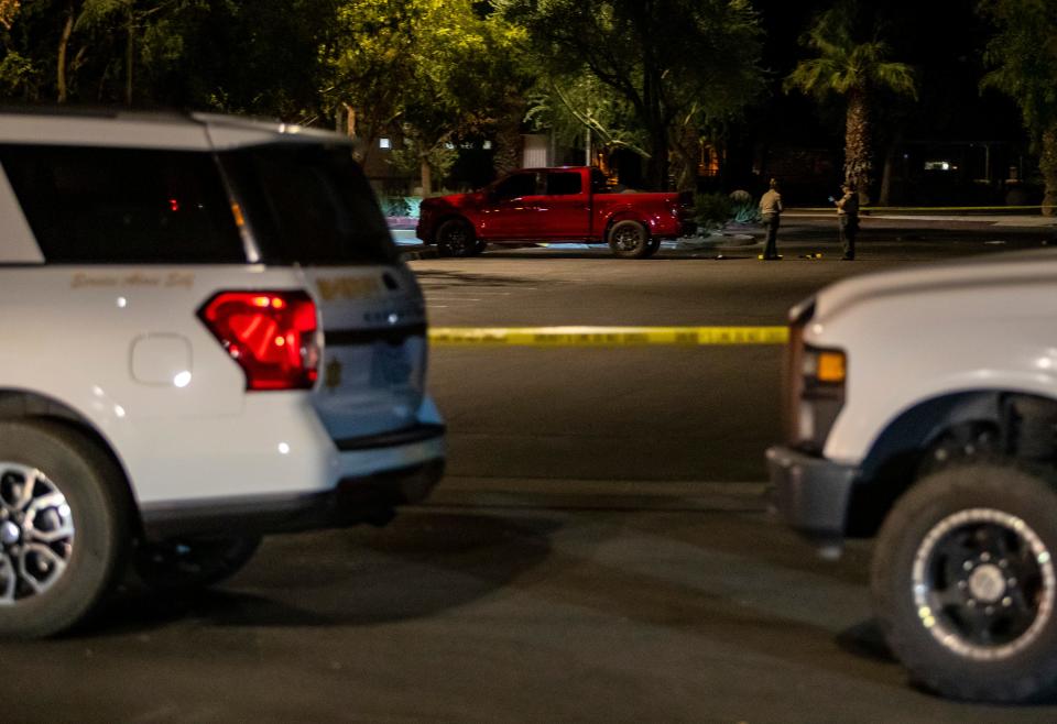 Riverside County sheriff's deputies along with the forensics team investigate a crime scene at Hovley Soccer Park in Palm Desert, Calif., Friday, Sept. 13, 2024.