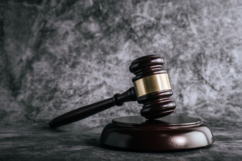 Wooden gavel on table in a courtroom