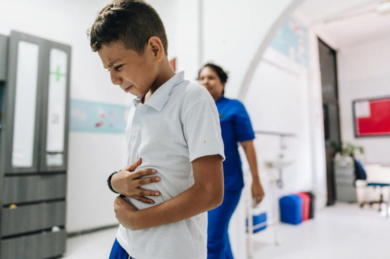 Child holding his stomach