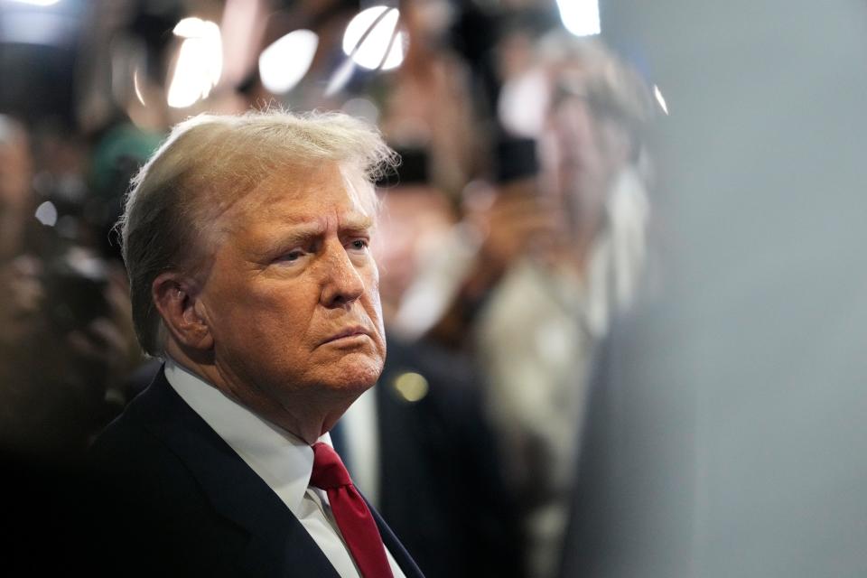 Former President Donald Trump speaks to reporters in the spin room of the Pennsylvania Convention Center following the ABC News presidential debate between him and Vice President Kamala Harris on September 10, 2024.