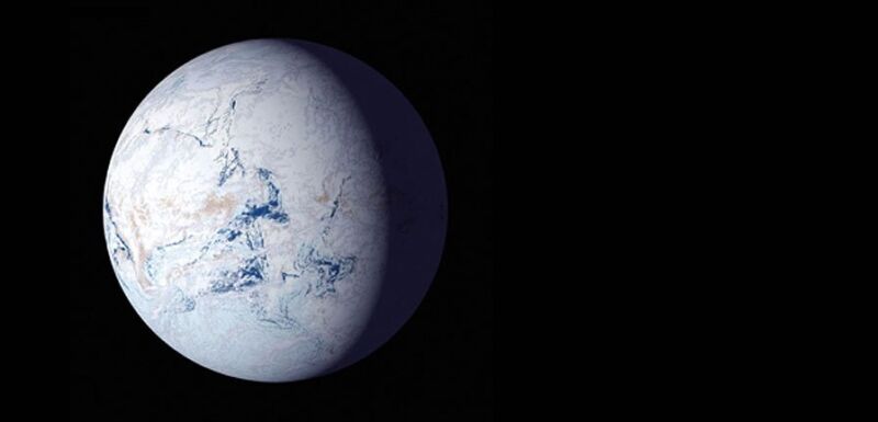 Image of a white planet with small blue spots against a black background.