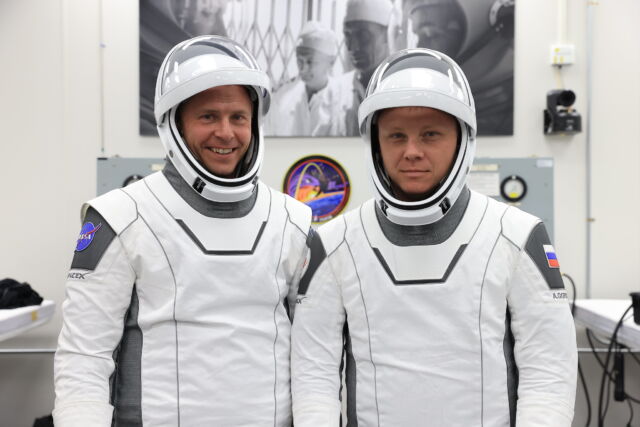 NASA astronaut Nick Haag and Russian cosmonaut Aleksandr Gorbunov in their SpaceX pressure suits.