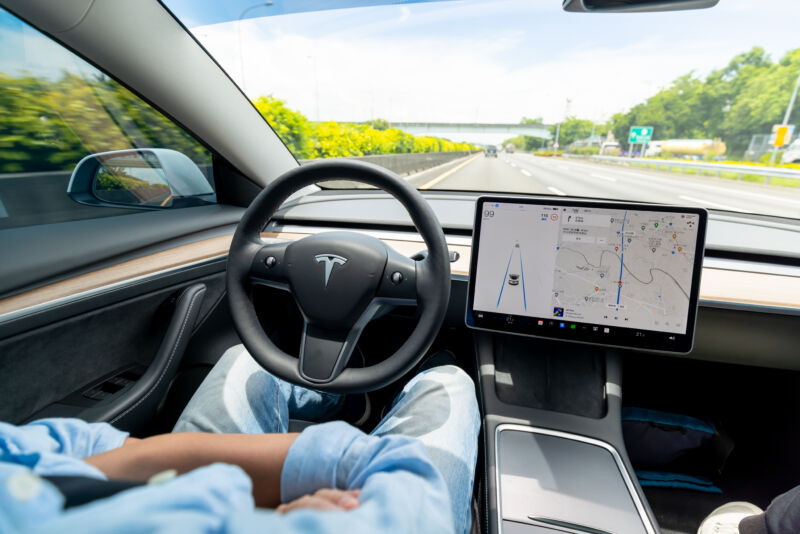 Koahsiung, Taiwan - June 16, 2022: Man driving an automatic car on the highway