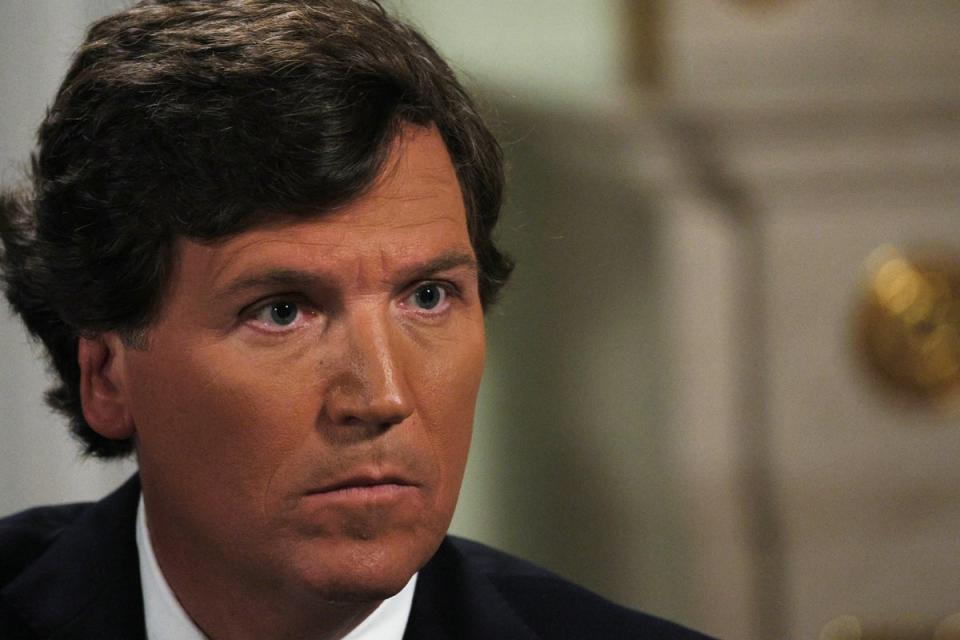 Tucker Carlson has come under fire for hosting a 'Nazi apologist' on his podcast (POOL/AFP via Getty Images)