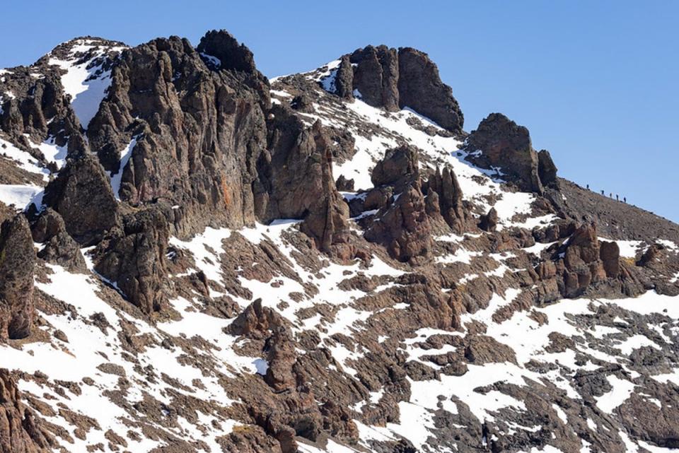 Ground crew climb the southwest ridge of Eagle Peak toward Austin (Yellowstone National Park)