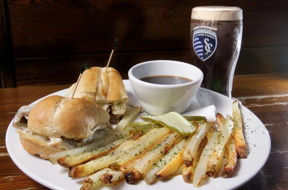 Conroy's Public House offers a prime rib French dip sandwich with caramelized onions, provolone cheese and horseradish aioli. Served with Au Jus and French cut roasted potatoes.