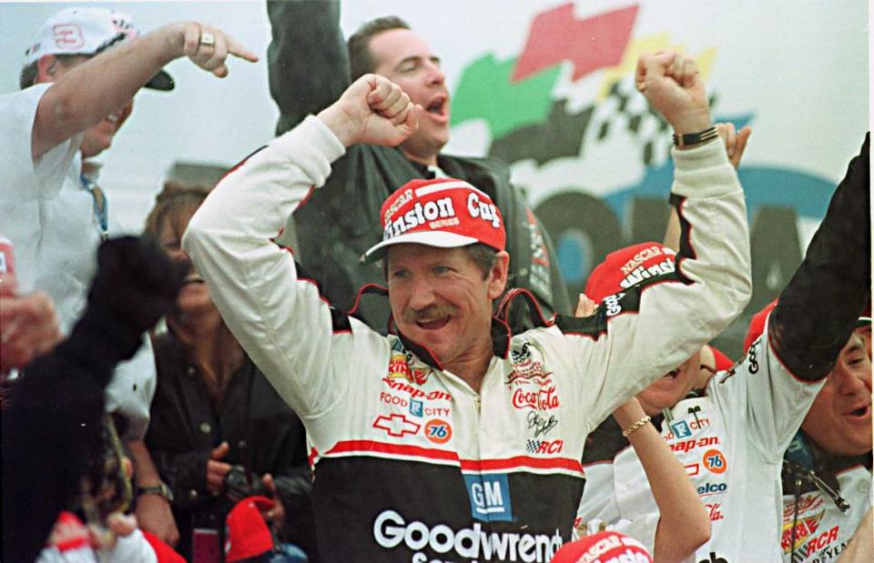 Dale Earnhardt celebrates at Daytona International Speedway on February 16, 1998, after winning the Daytona 500. It was the only major race that Earnhardt had not won. An “immaculately preserved” Dale Earnhardt race car No. 3 tops the list of memorabilia his longtime friend and NASCAR team owner Richard Childress is auctioning for COVID-19 relief.