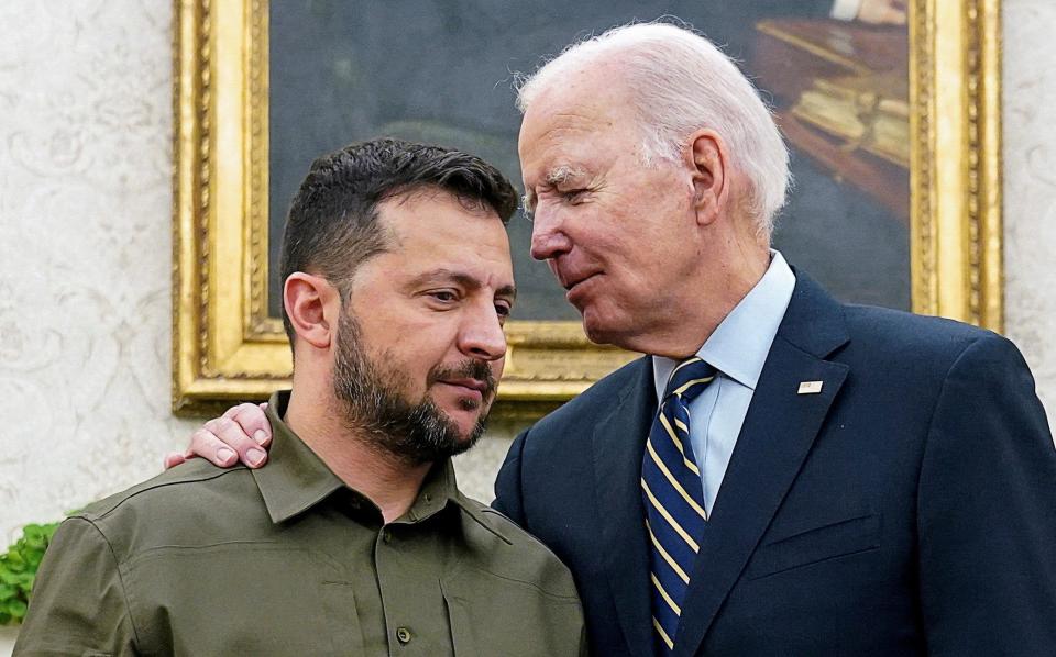 US President Joe Biden embraces Volodymyr Zelenskyy, the Ukrainian president, in the Oval Office of the White House