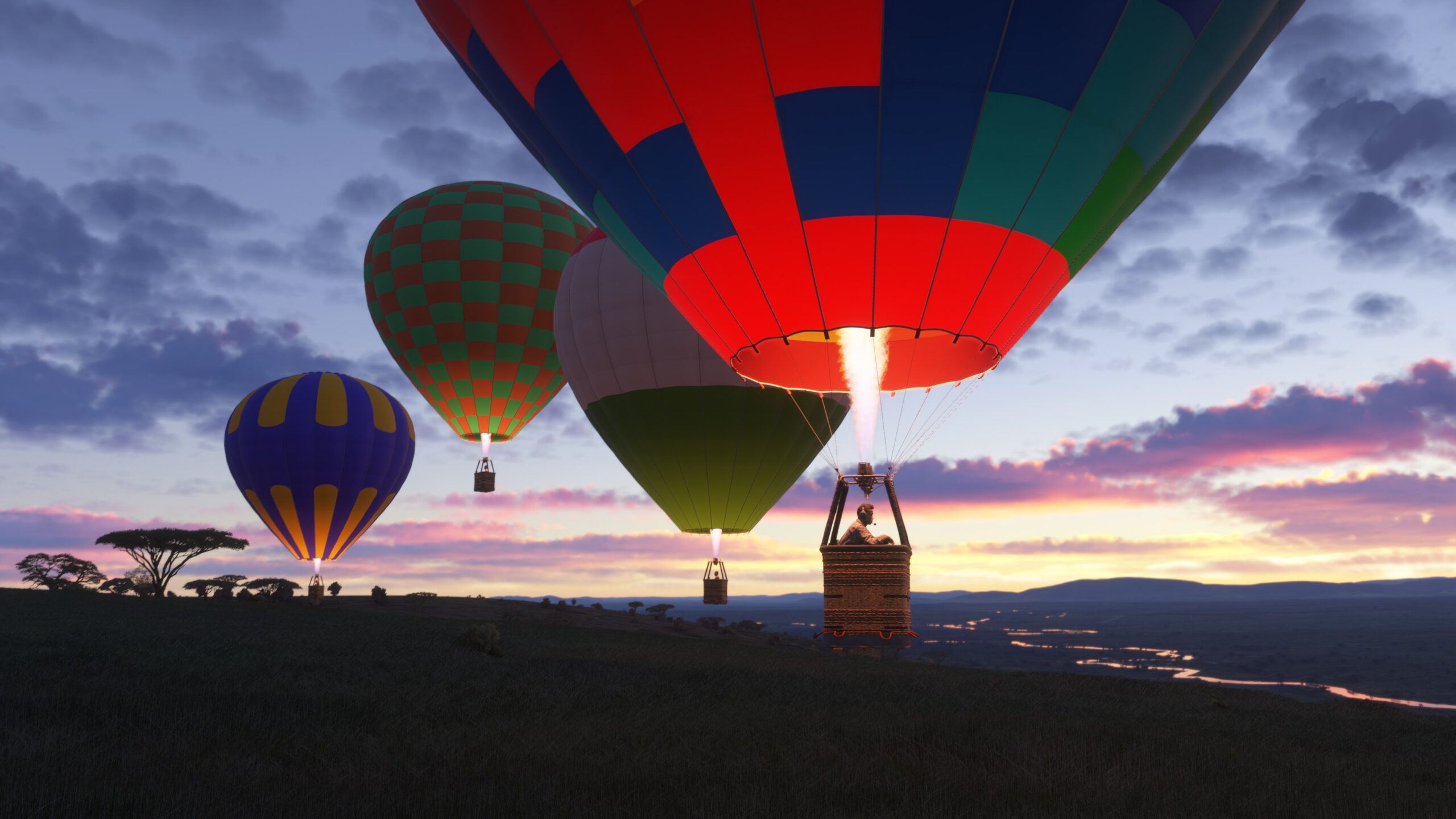 Hot air balloons over a night sky.