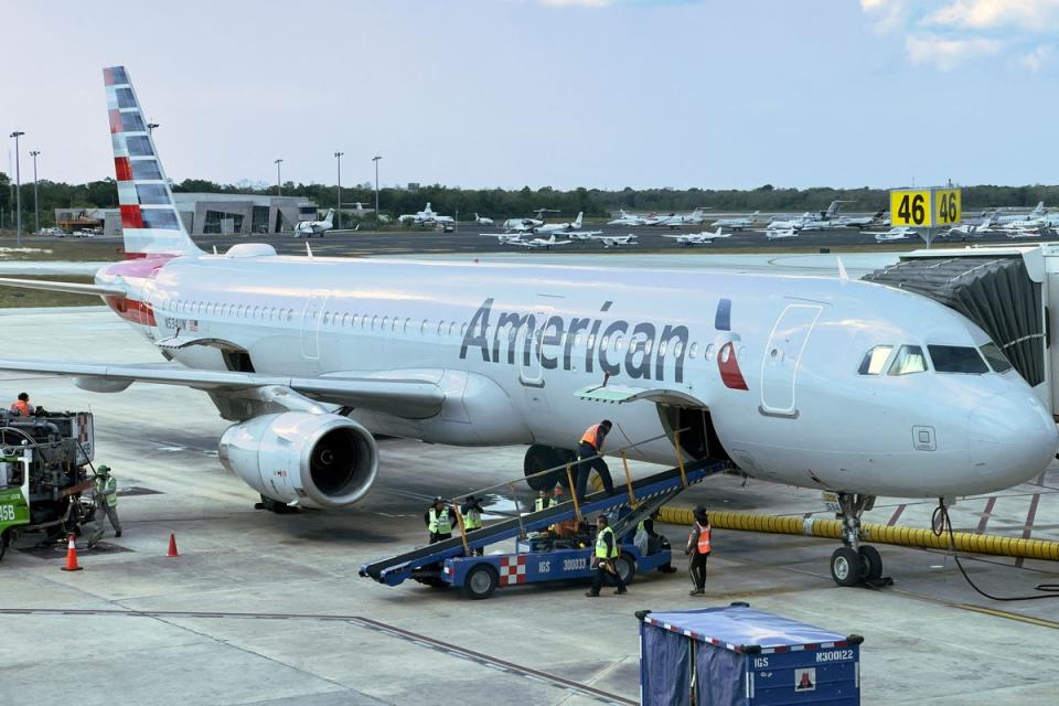 American Airlines passenger complains about accident involving uncomfortable seat during flight (AFP via Getty Images)