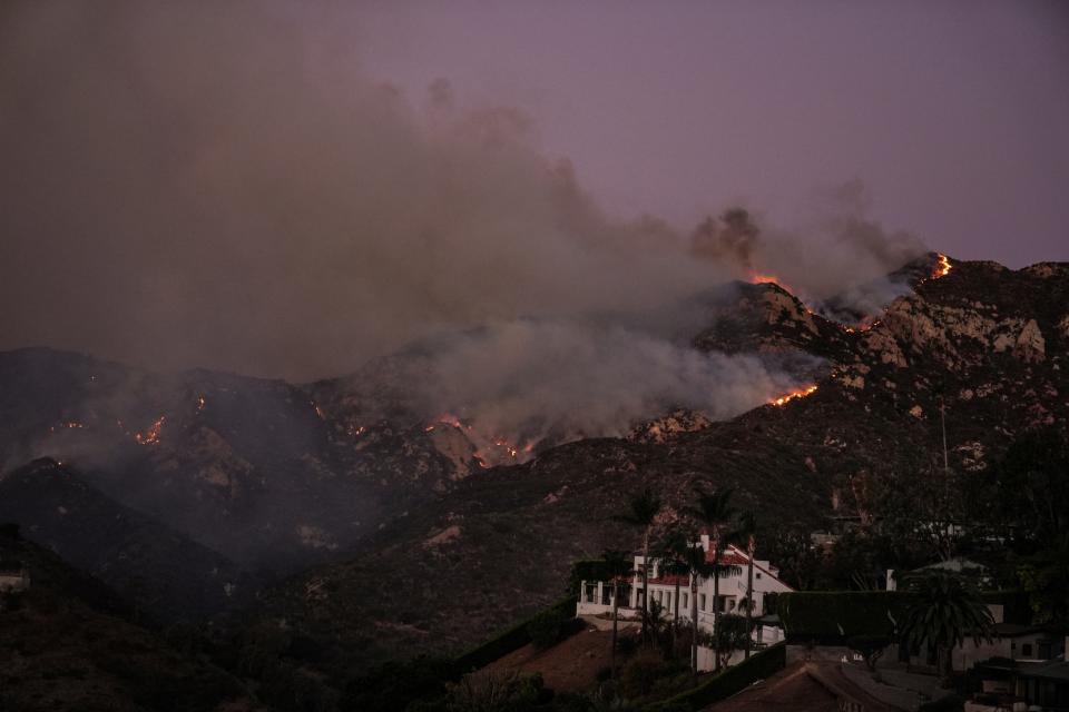 The Franklin Fire is burning in Malibu, California on Tuesday. Smoke has filled the air ((AP Photo/Jae C. Hong))