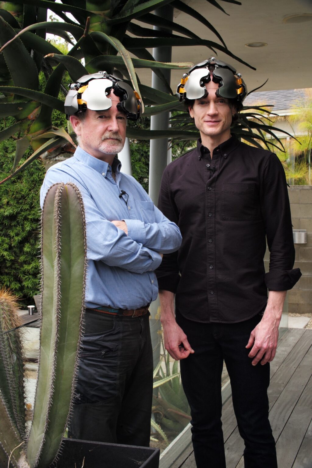 Columbia University neuroscientist Rafael Yuste (left) while Kernel founder Bryan Johnson (right) wears a brain-computer interface cap