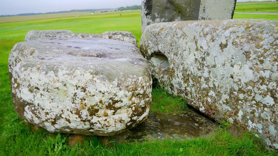     The Altar Stone can be seen beneath two larger sarsen stones. – Nick Pearce/Aberystwyth University