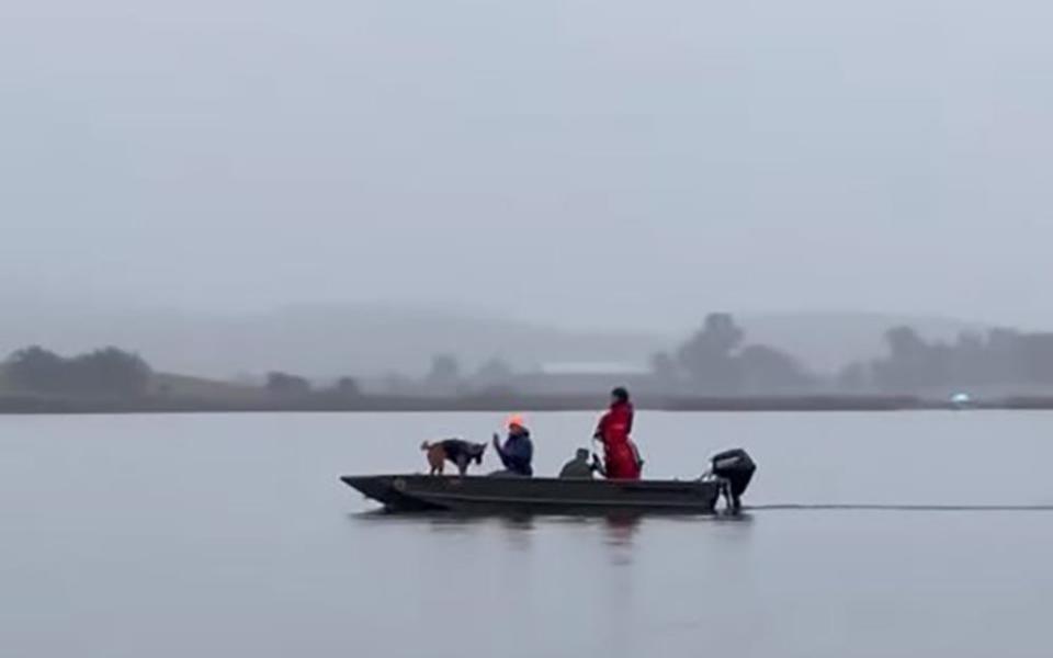 Rescuers and volunteer divers search for two teenage duck hunters at Thermalito Afterbay in Butte County. The brothers have been missing since one overturned his kayak and the other swam out to help on Saturday morning, December 14, 2024.