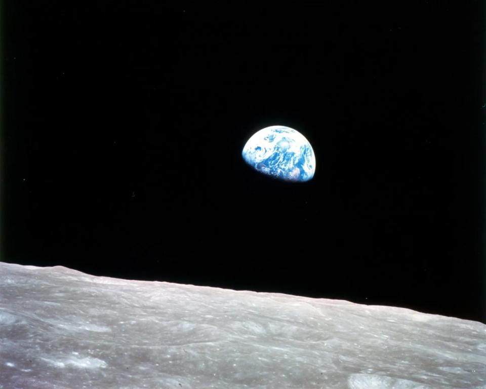 The iconic 'Earthrise' image shows Earth appearing above the moon's horizon on Christmas Eve 1968. Scientists say Earth has exceeded six of its nine boundaries that define a safe operating space for humanity (NASA)