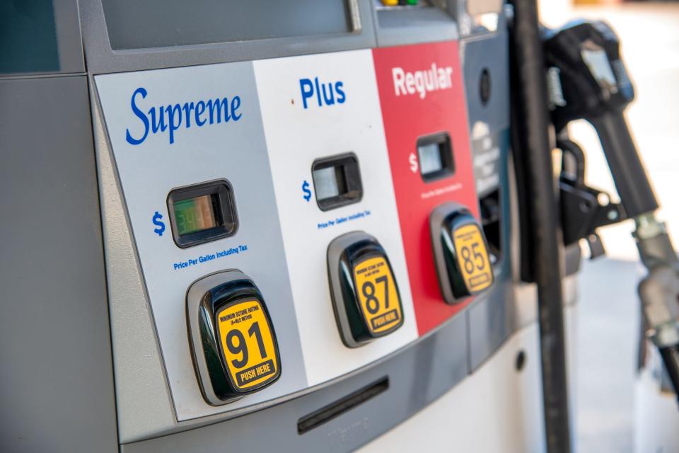 Supreme, Plus, Regular petrol at the gas station pump