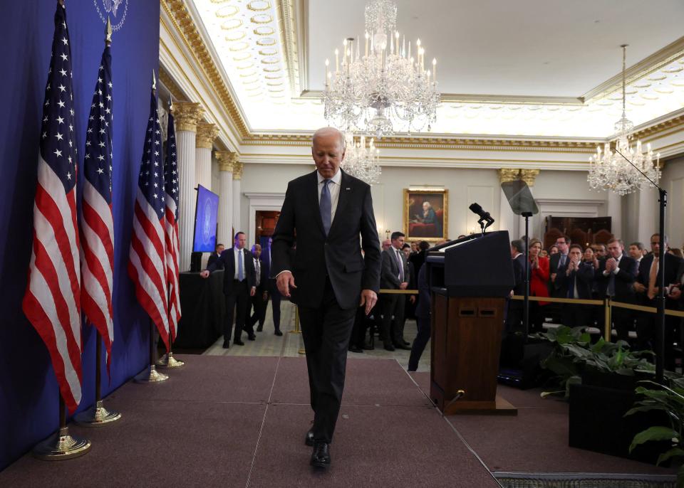 President Joe Biden leaves the stage after speaking at the State Department in Washington, DC, on January 13, 2025.