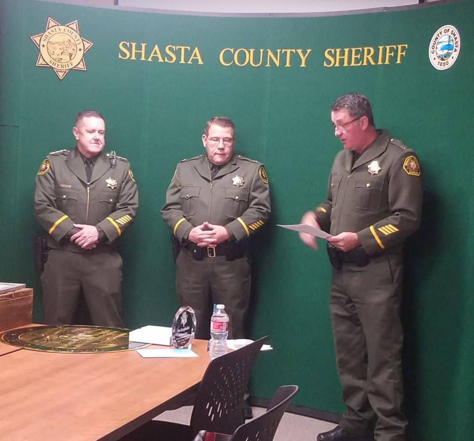 A photo of Patrick Kropholler's retirement ceremony was posted on Facebook earlier this year. From left are Sheriff Michael Johnson, Kropholler, center, and Captain Brian Jackson.