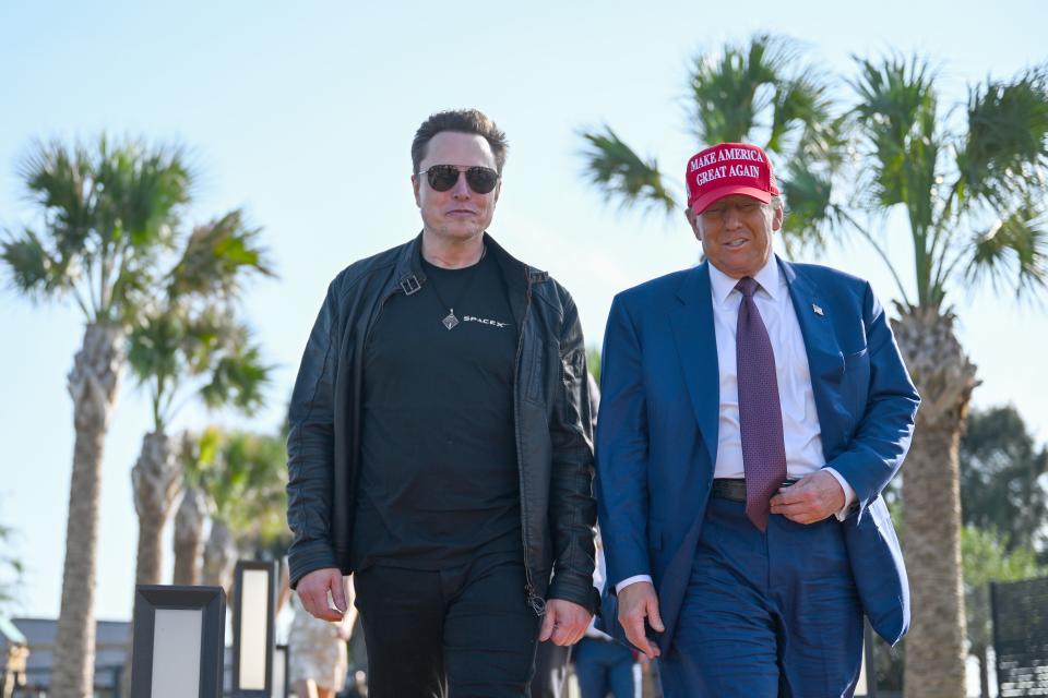 Newly elected US President Donald Trump greets Elon Musk as he arrives to attend a viewing of the launch of the sixth test flight of the SpaceX Starship rocket on November 19, 2024 in Brownsville, Texas. / Brandon Bell / Brandon Bell/Getty Images