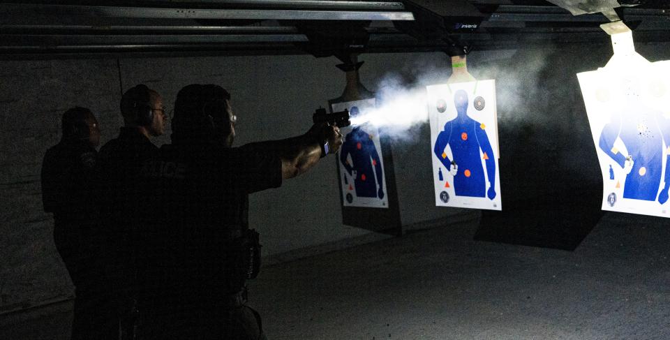 Police officers from Naples from front to back, Lt. Bryan McGinn, Sgt. Benjamin Vasquez and master officer Reyes train on the fire range in the Alamo by Lotus Gunworks in Naples on Monday, January 13, 2025. They were firewapentraining with the implementation of Nachtvizien. Not shown are Lt. Seth Finman, coordinator of firearms, Jacob Christenson, a firearm instructor and SGT. Mike Harmeling, a reach instructor. They are all police officers in Naples.