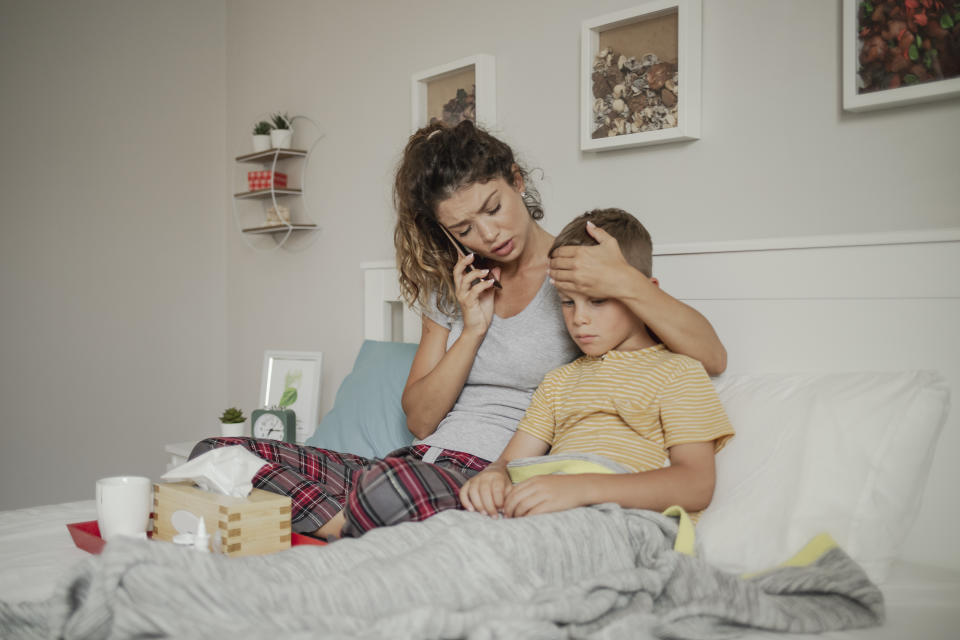 Worried mother with her son. 