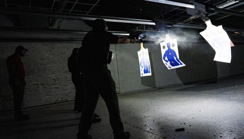 Police officers from Naples from front to back, Lt. Bryan McGinn, Sgt. Benjamin Vasquez and master officer Reyes train on the fire range in the Alamo by Lotus Gunworks in Naples on Monday, January 13, 2025. They were firewapentraining with the implementation of Nachtvizien. They were trained by Lt. Seth Finman, coordinator of firearms, Jacob Christenson, a firearm instructor and SGT. Mike Harmeling, left left, a reach instructor. They are all police officers in Naples.