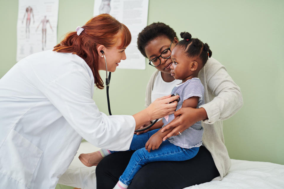 Child with epilepsy at a doctor's appointment. 